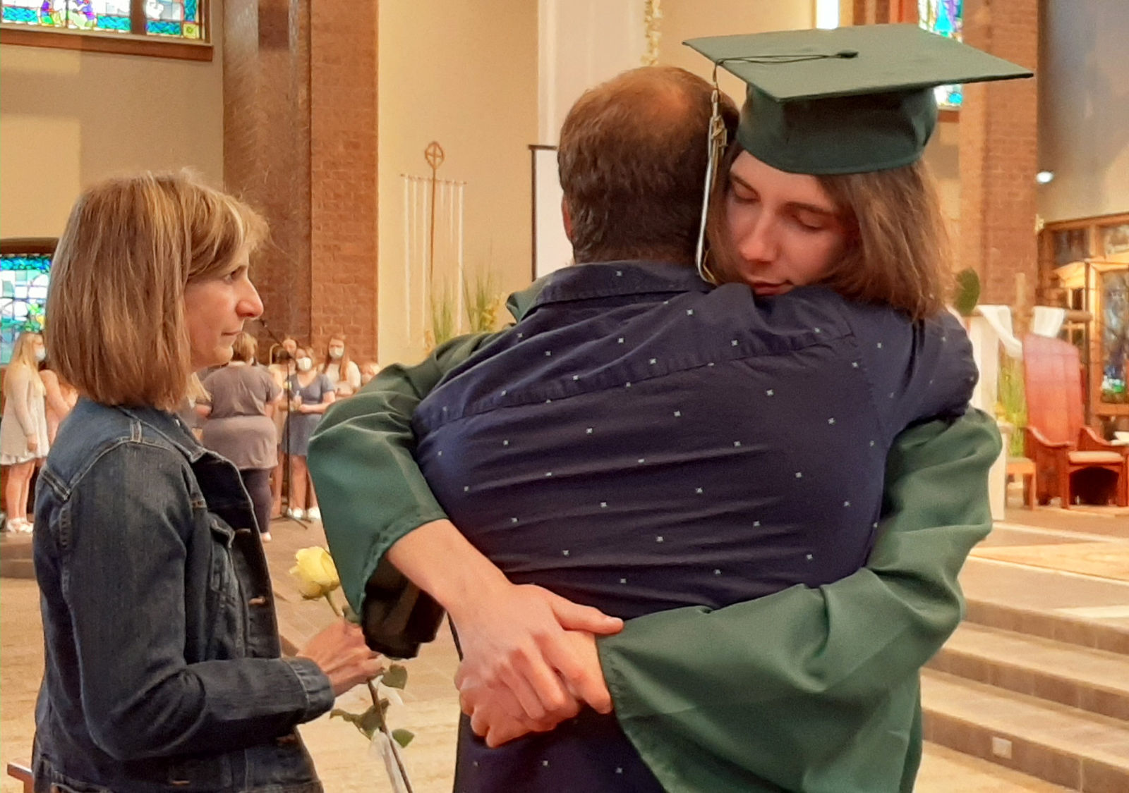 FRE Grad hugging dad.jpg